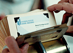 [gif: Hannibal selects the business card of a rude person to have for dinner. Source]