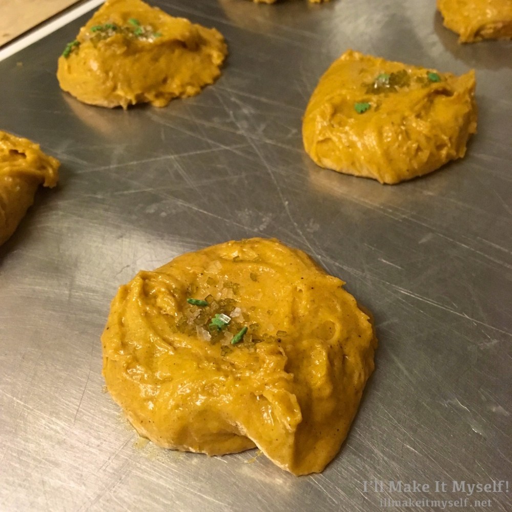 Image: raw pumpkin cookies on a baking tray, about to go in the oven