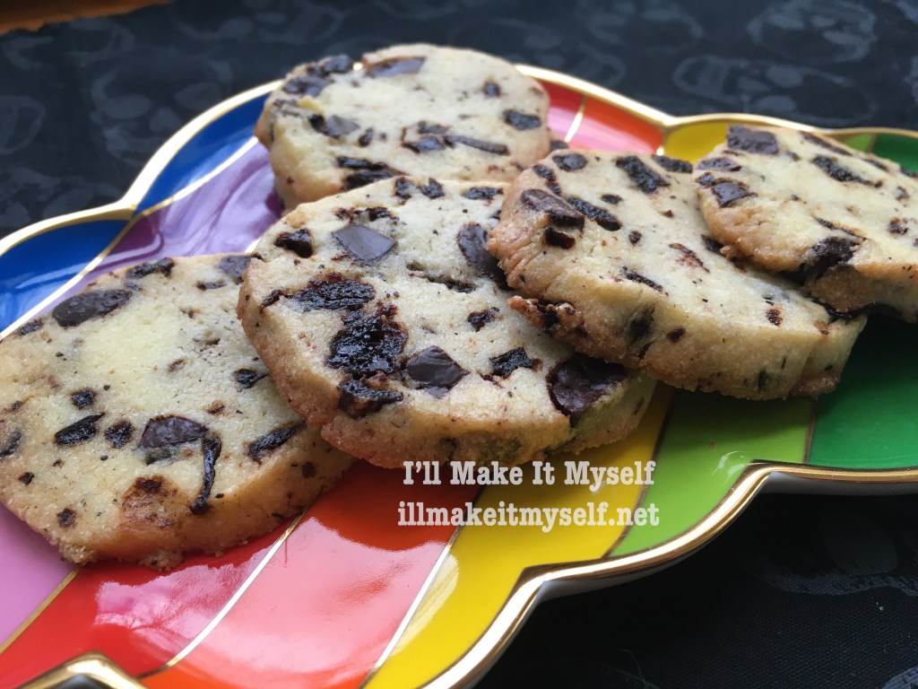 Photo of the cherry and chocolate coffee butter cookies on a rainbow platter.